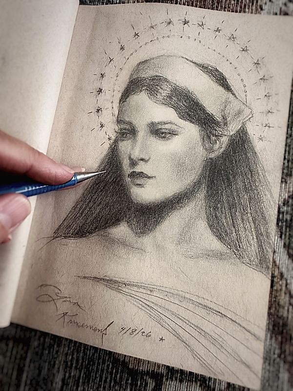 Star Nurse, Graphite sketch of a young woman with long dark hair, a headscarf, and a halo of small stars, shown on aged sketchbook paper with a pencil pointing near the drawing., 2026 graphite painting on paper by Laura L. Krusemark