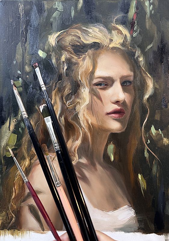 In progress at the easel with brushes